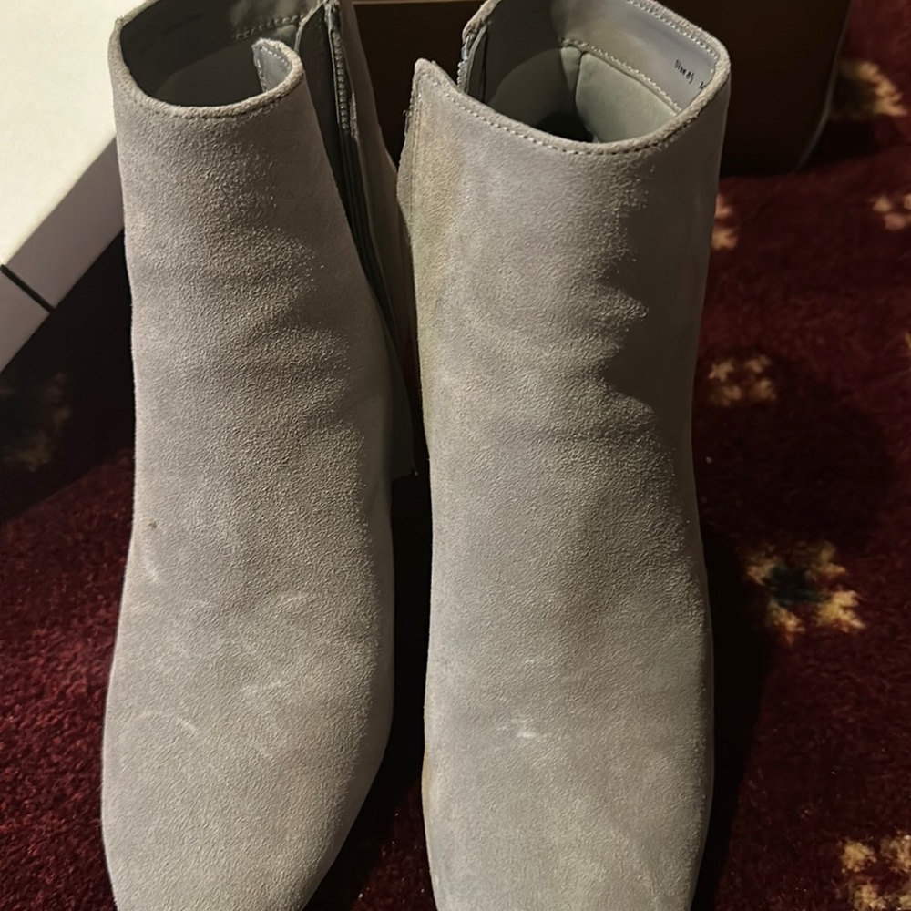 Light grey bootie heel and zipper on the side